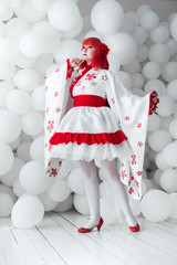 girl in kimano on the background of balls