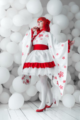girl in kimano on the background of balls