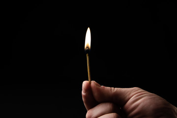 Burning matches close-up image. Matches flame macro image on dark background.