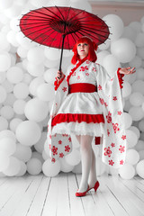 girl in kimano on the background of balls