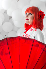 girl in kimano on the background of balls