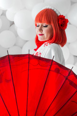 girl in kimano on the background of balls
