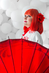 girl in kimano on the background of balls