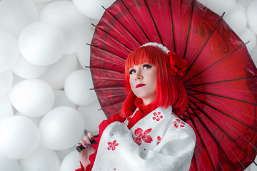 girl in kimano on the background of balls