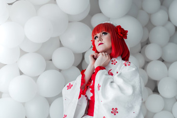 girl in kimano on the background of balls