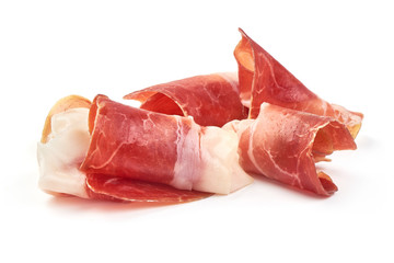 Italian prosciutto crudo or spanish jamon. Raw ham, close-up, isolated on white background