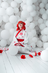 girl in kimano on the background of balls
