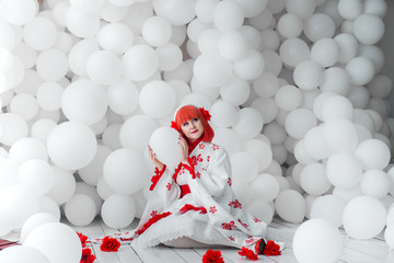 girl in kimano on the background of balls
