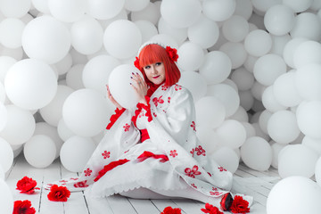 girl in kimano on the background of balls