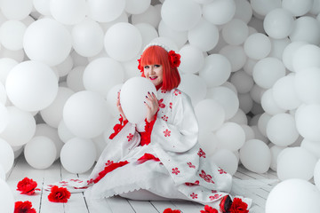 girl in kimano on the background of balls
