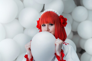 girl in kimano on the background of balls