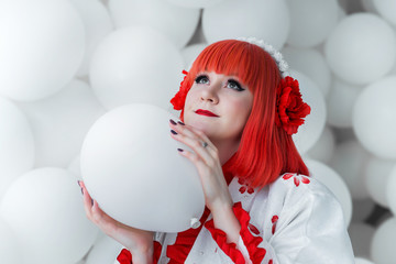 girl in kimano on the background of balls