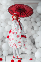 girl in kimano on the background of balls