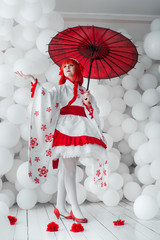 girl in kimano on the background of balls