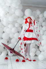girl in kimano on the background of balls