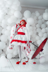 girl in kimano on the background of balls