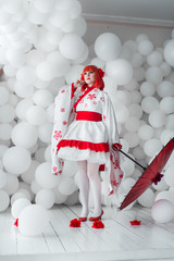 girl in kimano on the background of balls