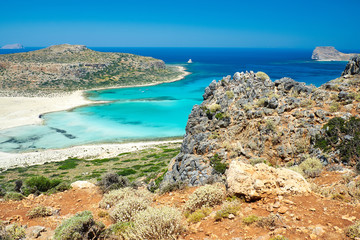 Fototapeta na wymiar Gramvousa Castle and Laguna Balos, Crete. Beautiful beach with clear blue water. View of the island from the opposite shore.