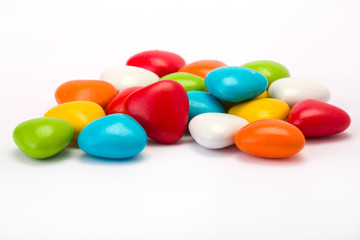 dragees with chocolate filing on white background