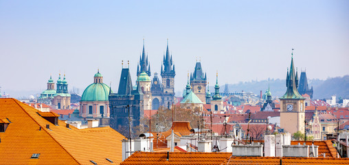 Obraz premium Panarama of Prague rooftops and skyline from Petrin hill, Prague, Czech Republic