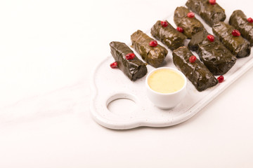 Traditional georgian cuisine. Dolma in grape leaves
