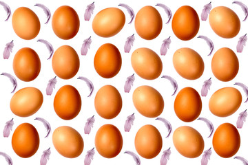 Easter eggs in baskets with tulips and feathers.