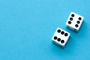 Gaming dices on blue background.
