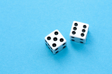 Gaming dices on blue background.