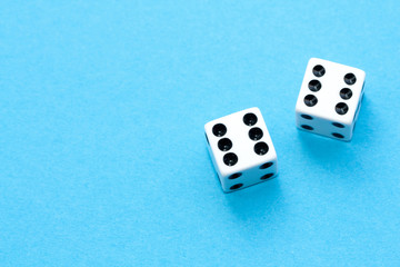 Gaming dices on blue background.