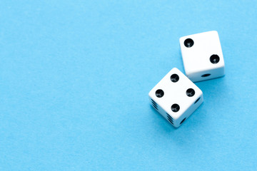 Gaming dices on blue background.