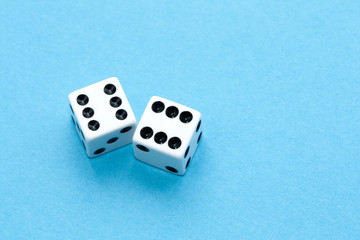 Gaming dices on blue background.