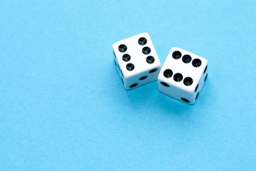 Gaming dices on blue background.