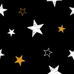 Obraz premium Hand drawn white and gold stars seamless pattern on the black background
