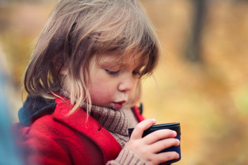 girl child drinks hot tea mood autumn cards