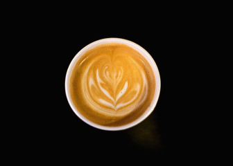 cup of coffee on black background