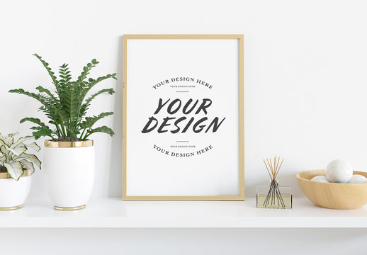 
Vertical Frame Leaning on Shelf with Plants Mockup