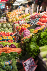 Several vegetables in a stall at the Pike Place Market in Seattle