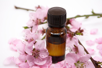 Cosmetic peach oil in a glass bottle Natural cosmetics