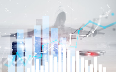 Graph on rows of coins for banking, finance on digital stock market financial exchange and trading graph.