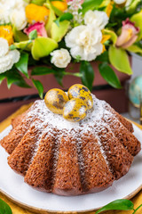 Chocolate Easter cake and Easter eggs. Selective focus.