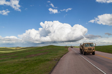 Fototapeta na wymiar Military Vehicles on the Prairie