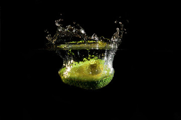 fresh avocado splash water