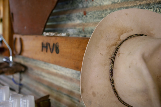 Akubra stockman's stained and dirty hat on hat stand