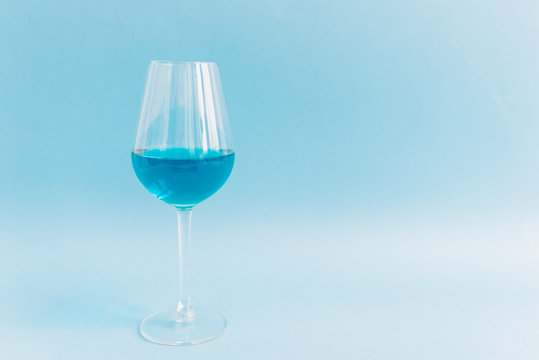 Glass of natural blue wine