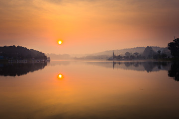 Fototapeta premium Sunrise over Xuan Huong Lake, Dalat, Vietnam