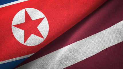 North Korea and Latvia two flags textile cloth, fabric texture