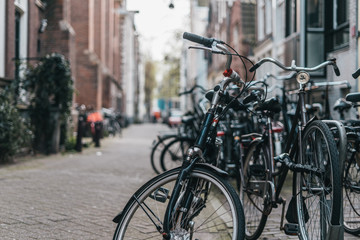 Fototapeta na wymiar Amsterdam bike parking on old streets