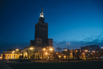 Fototapeta na wymiar Night photo with illuminated Palace of Science and Culture in Warsaw