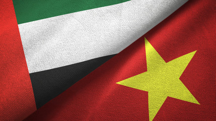 United Arab Emirates and Vietnam two flags textile cloth, fabric texture
