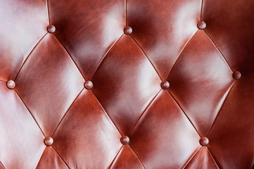 Pattern from vintage leather sofa for background, brown leather sofa.